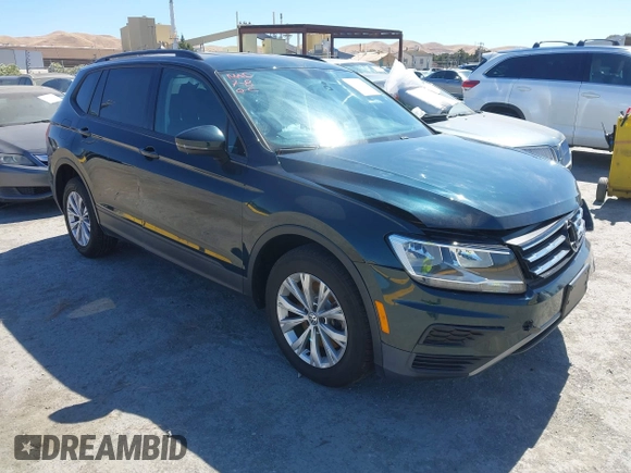 2018 Volkswagen Tiguan S with VIN 3VV1B7AX1JM165641, listed as a IAAI auction lot 42699622 with 75,354 mi miles and . Bid and sale history available at DreamBid. Image 1.