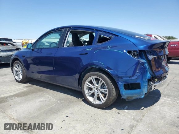 2024 Tesla Model Y z VIN 7SAYGDED9RF005104, wystawiony jako Copart lot #64974545 z przebiegiem 20 422 mil mil oraz Szkoda całkowita • Salvage title. Historia ofert i sprzedaży dostępna na DreamBid. Obrazek 2.