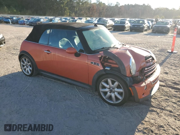 2007 MINI Convertible S with VIN WMWRH33587TJ43499, listed as a Copart auction lot 76266684 with 103,691 mi miles and Salvage title. Bid and sale history available at DreamBid. Image 4.