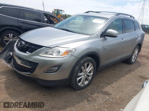 2011 Mazda CX-9 Grand Touring with VIN JM3TB3DV2B0332191, listed as a IAAI auction lot 42211435 with 155,801 mi miles and . Bid and sale history available at DreamBid. Image 2.
