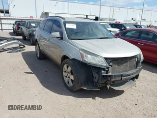 2014 Chevrolet Traverse LTZ z VIN 1GNKRJKDXEJ248849, wystawiony jako IAAI lot #41805119 z przebiegiem 171 489 mil mil oraz . Historia ofert i sprzedaży dostępna na DreamBid. Obrazek 1.
