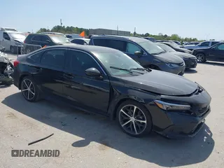 2024 Honda Civic Touring z VIN 2HGFE1F9XRH326146, wystawiony jako IAAI lot #41835336 z przebiegiem 8 469 mil mil oraz . Historia ofert i sprzedaży dostępna na DreamBid. Obrazek 1.