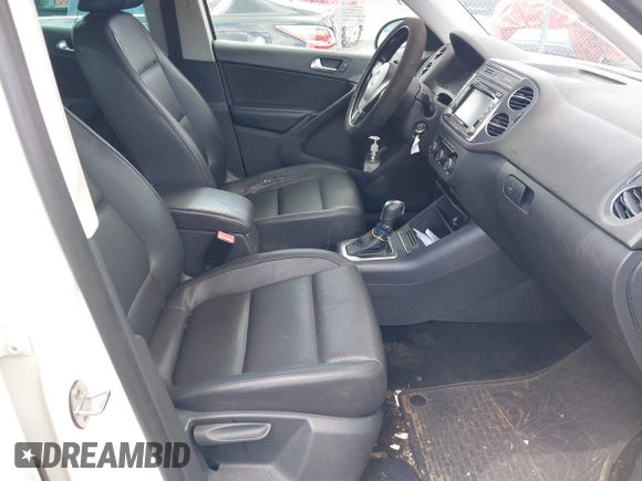 2012 Volkswagen Tiguan S with VIN WVGAV7AX0CW566151, listed as a IAAI auction lot 42826985 with 121,185 mi miles and . Bid and sale history available at DreamBid. Image 5.