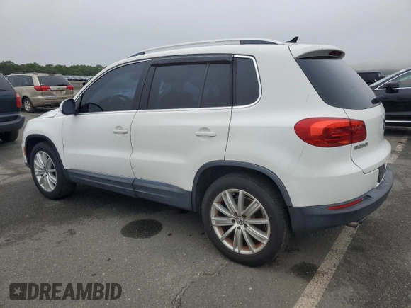 2013 Volkswagen Tiguan SE with VIN WVGAV3AX1DW574009, listed as a Copart auction lot 60936735 with 121,624 mi miles and Clean title. Bid and sale history available at DreamBid. Image 2.