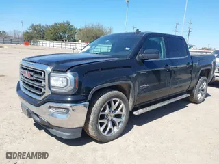 2016 GMC Sierra 1500 SLE with VIN 3GTP1MEC6GG326042, listed as a IAAI auction lot 41763153 with 127,968 mi miles. Bid and sale history available at carsss.com. Image 2.