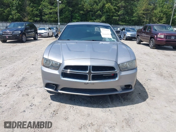 2013 Dodge Charger SE z VIN 2C3CDXBG0DH639988, wystawiony jako IAAI lot #40032112 z przebiegiem 197 941 mil mil oraz . Historia ofert i sprzedaży dostępna na DreamBid. Obrazek 6.