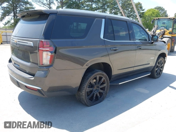 2021 Chevrolet Tahoe LT with VIN 1GNSCNKD8MR183394, listed as a IAAI auction lot 41921631 with 79,842 mi miles and . Bid and sale history available at DreamBid. Image 4.