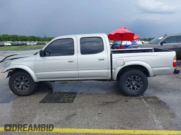2003 Toyota Tacoma PreRunner z VIN 5TEGN92N13Z295384, wystawiony jako IAAI lot #42406105 z przebiegiem 194 171 mil mil oraz . Historia ofert i sprzedaży dostępna na DreamBid. Obrazek 14.