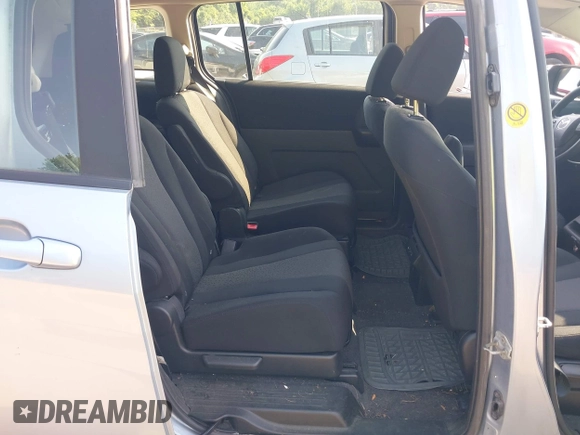 2012 Mazda 5 Sport with VIN JM1CW2BL5C0109542, listed as a IAAI auction lot 42494218 with 248,428 mi miles and . Bid and sale history available at DreamBid. Image 8.