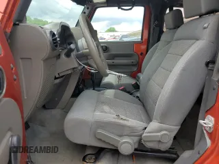 2009 Jeep Wrangler X z VIN 1J4FA24139L740959, wystawiony jako Copart lot #56509075 z przebiegiem 121 927 mil mil oraz Szkoda całkowita • Salvage title. Historia ofert i sprzedaży dostępna na DreamBid. Obrazek 7.