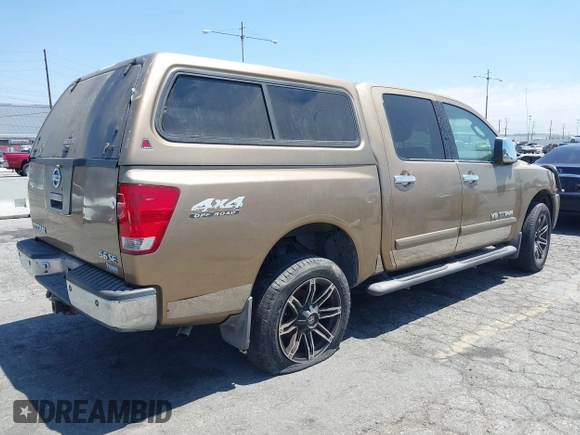 2005 Nissan Titan LE with VIN 1N6AA07B95N508001, listed as a IAAI auction lot 42656008 with 196,542 mi miles and . Bid and sale history available at DreamBid. Image 4.