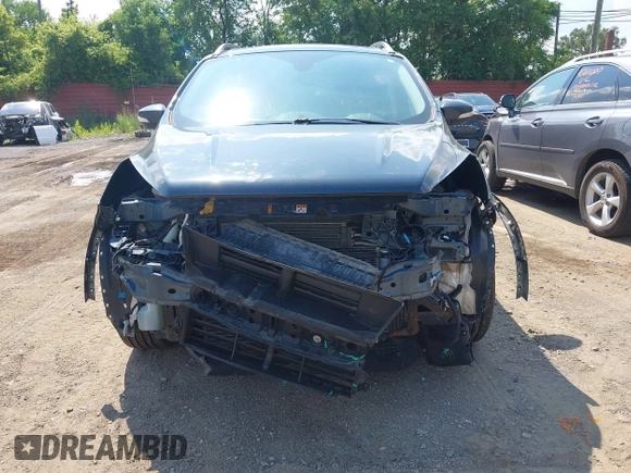 2019 Ford Escape Titanium with VIN 1FMCU9J99KUC00935, listed as a IAAI auction lot 42583250 with 91,241 mi miles and . Bid and sale history available at DreamBid. Image 13.