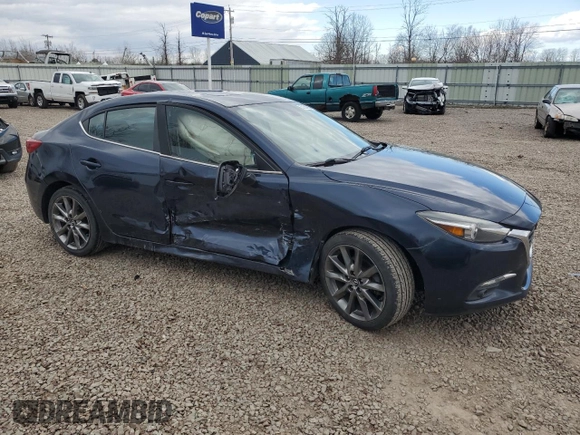2018 Mazda 3 Grand Touring z VIN 3MZBN1W38JM190398, wystawiony jako Copart lot #53164605 z przebiegiem 74 845 mil mil oraz Szkoda całkowita • Salvage title. Historia ofert i sprzedaży dostępna na DreamBid. Obrazek 4.