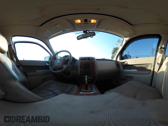 2011 Mercury Mariner Premier with VIN 4M2CN8HG0BKJ02401, listed as a IAAI auction lot 42579483 with 126,276 mi miles and . Bid and sale history available at DreamBid. Image 18.