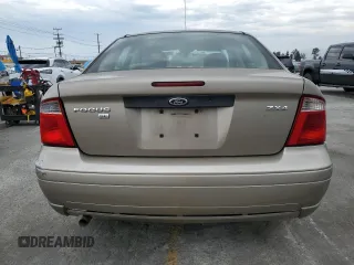 2005 Ford Focus S with VIN 1FAFP34N55W105530, listed as a Copart auction lot 59186695 with 136,204 mi miles and Salvage title. Bid and sale history available at DreamBid. Image 6.