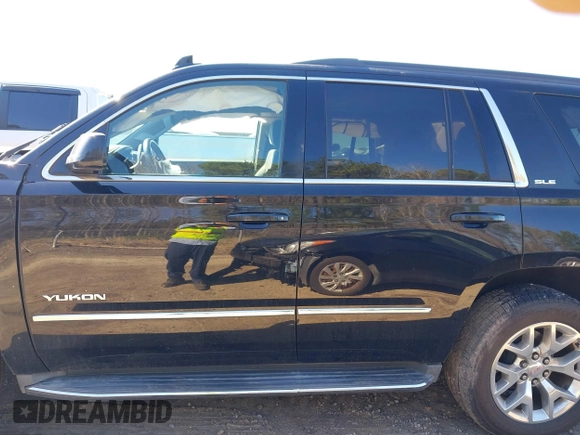 2015 GMC Yukon SLE with VIN 1GKS2AKC4FR720667, listed as a IAAI auction lot 41822277 with 134,984 mi miles and . Bid and sale history available at DreamBid. Image 15.