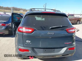 2017 Jeep Cherokee Trailhawk L Plus with VIN 1C4PJMBBXHW634944, listed as a IAAI auction lot 41022673 with 116,542 mi miles. Bid and sale history available at carsss.com. Image 17.