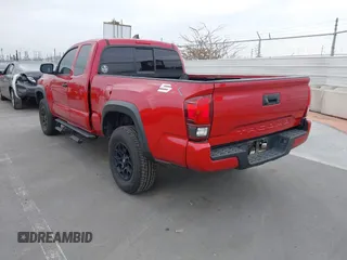 2020 Toyota Tacoma SR with VIN 3TYRX5GNXLT005469, listed as a IAAI auction lot 42267836 with 84,628 mi miles and . Bid and sale history available at DreamBid. Image 3.