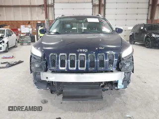 2015 Jeep Cherokee Limited with VIN 1C4PJMDB4FW775065, listed as a IAAI auction lot 42044247 with 125,131 mi miles and . Bid and sale history available at DreamBid. Image 6.