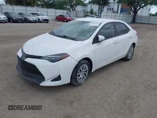 2019 Toyota Corolla L with VIN 5YFBURHE7KP908794, listed as a IAAI auction lot 38524964 with 65,069 mi miles. Bid and sale history available at carsss.com. Image 2.