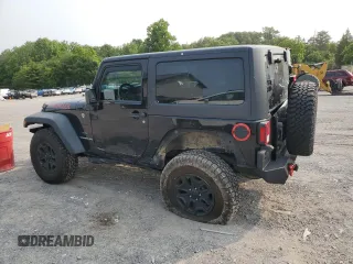 2013 Jeep Wrangler Sport z VIN 1C4AJWAG5DL671491, wystawiony jako Copart lot #59306745 z przebiegiem 111 778 mil mil oraz Szkoda całkowita • Salvage title. Historia ofert i sprzedaży dostępna na DreamBid. Obrazek 2.