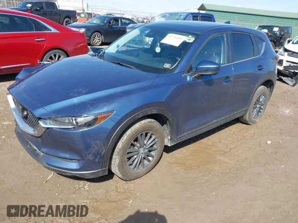 2021 Mazda CX-5 Touring with VIN JM3KFBCM4M0404093, listed as a IAAI auction lot 41751343 with 50,536 mi miles. Bid and sale history available at carsss.com. Image 17.