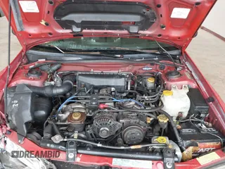 1999 Subaru Impreza Outback Special Sports z VIN JF1GF4854XH815209, wystawiony jako IAAI lot #42235555 z przebiegiem 294 867 mil mil oraz . Historia ofert i sprzedaży dostępna na DreamBid. Obrazek 10.