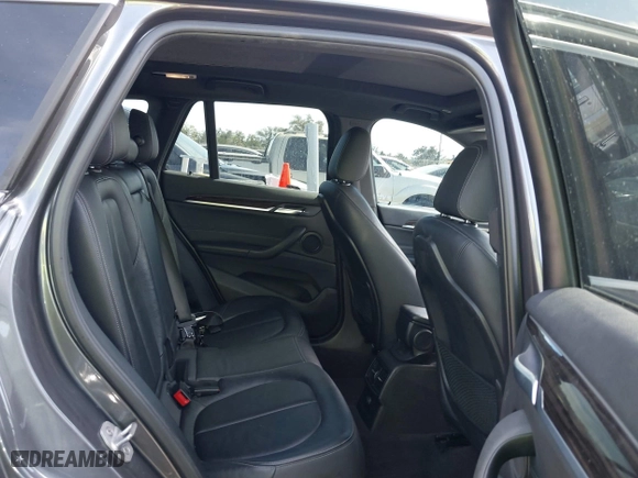 2017 BMW X1 xDrive28i with VIN WBXHT3Z33H4A65198, listed as a IAAI auction lot 41798503 with 88,951 mi miles. Bid and sale history available at carsss.com. Image 8.