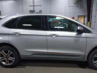 2016 Ford Edge Titanium with VIN 2FMPK4K92GBB42155, listed as a IAAI auction lot 41843234 with 191,456 mi miles and . Bid and sale history available at DreamBid. Image 14.