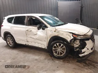 2020 Hyundai Santa Fe SE with VIN 5NMS2CAD8LH163523, listed as a IAAI auction lot 42123756 with 72,992 mi miles and . Bid and sale history available at DreamBid. Image 6.