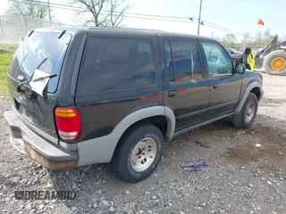 1999 Ford Explorer XL z VIN 1FMZU34X2XUA06174, wystawiony jako IAAI lot #42071003 z przebiegiem 126 220 mil mil oraz . Historia ofert i sprzedaży dostępna na DreamBid. Obrazek 4.