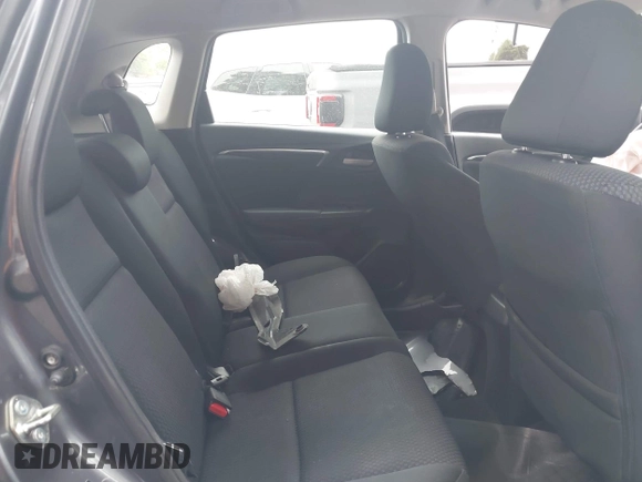 2020 Honda Fit LX with VIN 3HGGK5H40LM701895, listed as a IAAI auction lot 42432492 with 122,212 mi miles and . Bid and sale history available at DreamBid. Image 8.