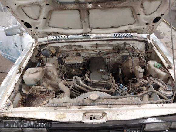 1982 Datsun 720 z VIN JN6MD01S7CW103064, wystawiony jako IAAI lot #41831434 z przebiegiem 175 954 mil mil oraz . Historia ofert i sprzedaży dostępna na DreamBid. Obrazek 10.