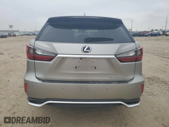 2021 Lexus RX 350L with VIN JTJHZKEA3M2022121, listed as a Copart auction lot 83263024 with 39,684 mi miles and Salvage title. Bid and sale history available at DreamBid. Image 6.
