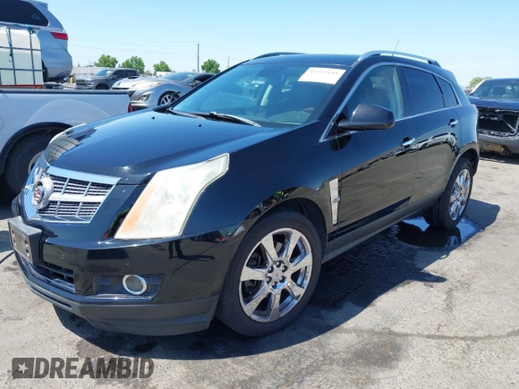 2012 Cadillac SRX Performance Collection z VIN 3GYFNBE30CS659973, wystawiony jako IAAI lot #42555119 z przebiegiem 141 842 mil mil oraz . Historia ofert i sprzedaży dostępna na DreamBid. Obrazek 2.