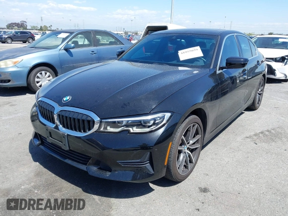 2019 BMW 3 Series 330i xDrive with VIN WBA5R7C5XKAJ78505, listed as a IAAI auction lot 41955059 with 53,216 mi miles. Bid and sale history available at carsss.com. Image 2.