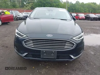 2020 Ford Fusion SEL z VIN 3FA6P0CD9LR183400, wystawiony jako IAAI lot #42271491 z przebiegiem 52 020 mil mil oraz . Historia ofert i sprzedaży dostępna na DreamBid. Obrazek 12.
