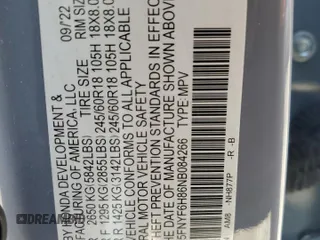2022 Honda Pilot TrailSport z VIN 5FNYF6H86NB084266, wystawiony jako Copart lot #52640885 z przebiegiem 32 651 mil mil oraz Szkoda całkowita • Salvage title. Historia ofert i sprzedaży dostępna na DreamBid. Obrazek 14.