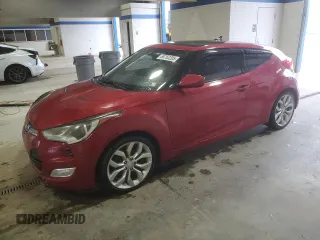 2015 Hyundai Veloster z VIN KMHTC6AD5FU240814, wystawiony jako Copart lot #58753205 z przebiegiem 102 339 mil mil oraz Czysty tytuł • Clean title. Historia ofert i sprzedaży dostępna na DreamBid. Obrazek 1.