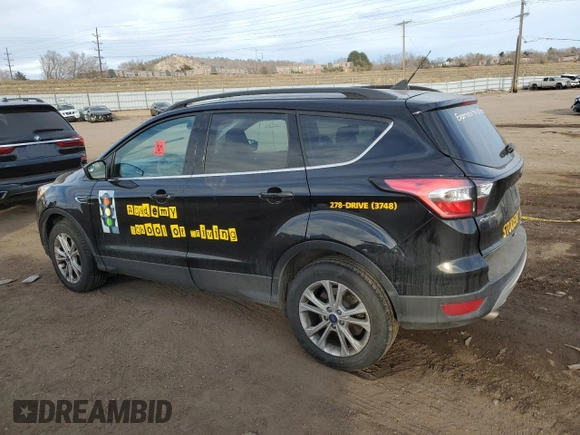 2018 Ford Escape SE z VIN 1FMCU9GDXJUD21466, wystawiony jako Copart lot #46266395 z przebiegiem Nie podano mil oraz Szkoda całkowita • Salvage title. Historia ofert i sprzedaży dostępna na DreamBid. Obrazek 2.
