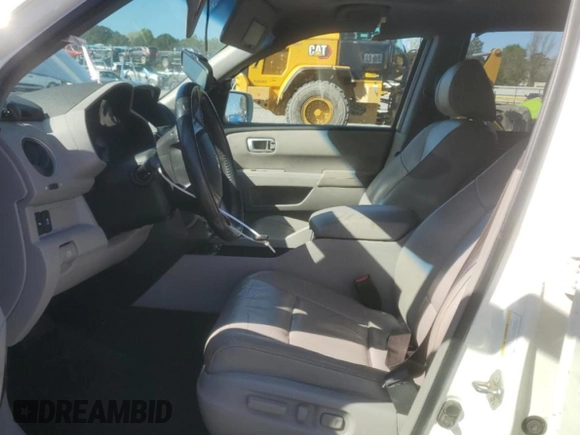 2013 Honda Pilot Touring with VIN 5FNYF4H92DB031771, listed as a Copart auction lot 50083125 with 229,059 mi miles and Salvage Title. Bid and sale history available at DreamBid. Image 7.