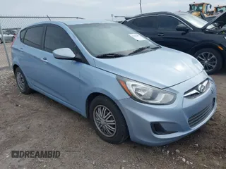 2014 Hyundai Accent GS with VIN KMHCT5AE1EU147015, listed as a IAAI auction lot 41659497 with 147,832 mi miles. Bid and sale history available at carsss.com. Image 1.