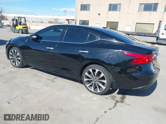 2016 Nissan Maxima SL with VIN 1N4AA6AP9GC448087, listed as a IAAI auction lot 41828781 with 99,436 mi miles and . Bid and sale history available at DreamBid. Image 3.