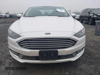 2017 Ford Fusion SE z VIN 3FA6P0H71HR201799, wystawiony jako IAAI lot #41346018 z przebiegiem 51 126 mil mil oraz . Historia ofert i sprzedaży dostępna na DreamBid. Obrazek 6.
