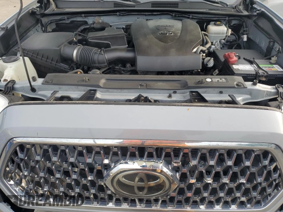 2019 Toyota Tacoma SR z VIN 3TMCZ5AN0KM227229, wystawiony jako Copart lot #54984895 z przebiegiem 244 400 mil mil oraz Czysty tytuł • Clean title. Historia ofert i sprzedaży dostępna na DreamBid. Obrazek 11.