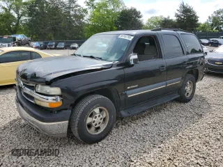2003 Chevrolet Tahoe LT with VIN 1GNEC13Z23R145867, listed as a Copart auction lot 56762795 with 308,881 mi miles and Salvage title. Bid and sale history available at DreamBid. Image 1.