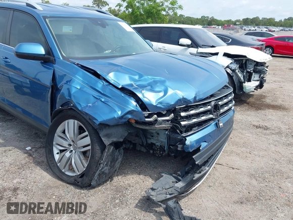 2019 Volkswagen Atlas SE z VIN 1V2WR2CA5KC524650, wystawiony jako IAAI lot #42217791 z przebiegiem 92 571 mil mil oraz . Historia ofert i sprzedaży dostępna na DreamBid. Obrazek 6.