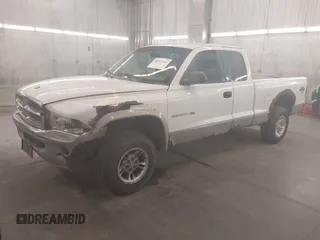 1999 Dodge Dakota SLT with VIN 1B7GG22XXXS254782, listed as a IAAI auction lot 41847644 with 164,607 mi miles and . Bid and sale history available at carsss.com. Image 2.