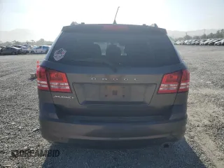 2014 Dodge Journey American Value with VIN 3C4PDCABXET277897, listed as a Copart auction lot 60566735 with 113,343 mi miles and Salvage title. Bid and sale history available at DreamBid. Image 6.