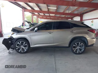 2017 Lexus RX 350 with VIN 2T2ZZMCA8HC049730, listed as a IAAI auction lot 42553907 with 122,522 mi miles and . Bid and sale history available at DreamBid. Image 14.